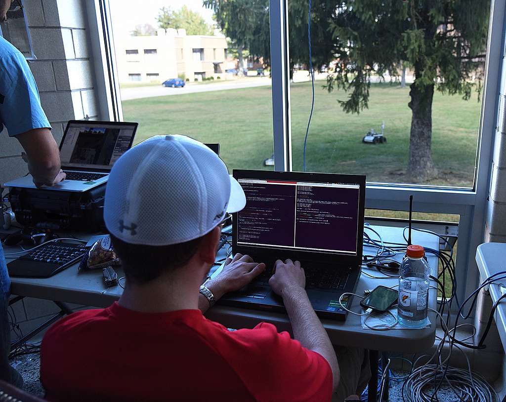 a computer engineer with his colleagues