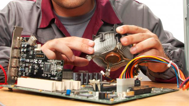 Computer Technician working with PC devices